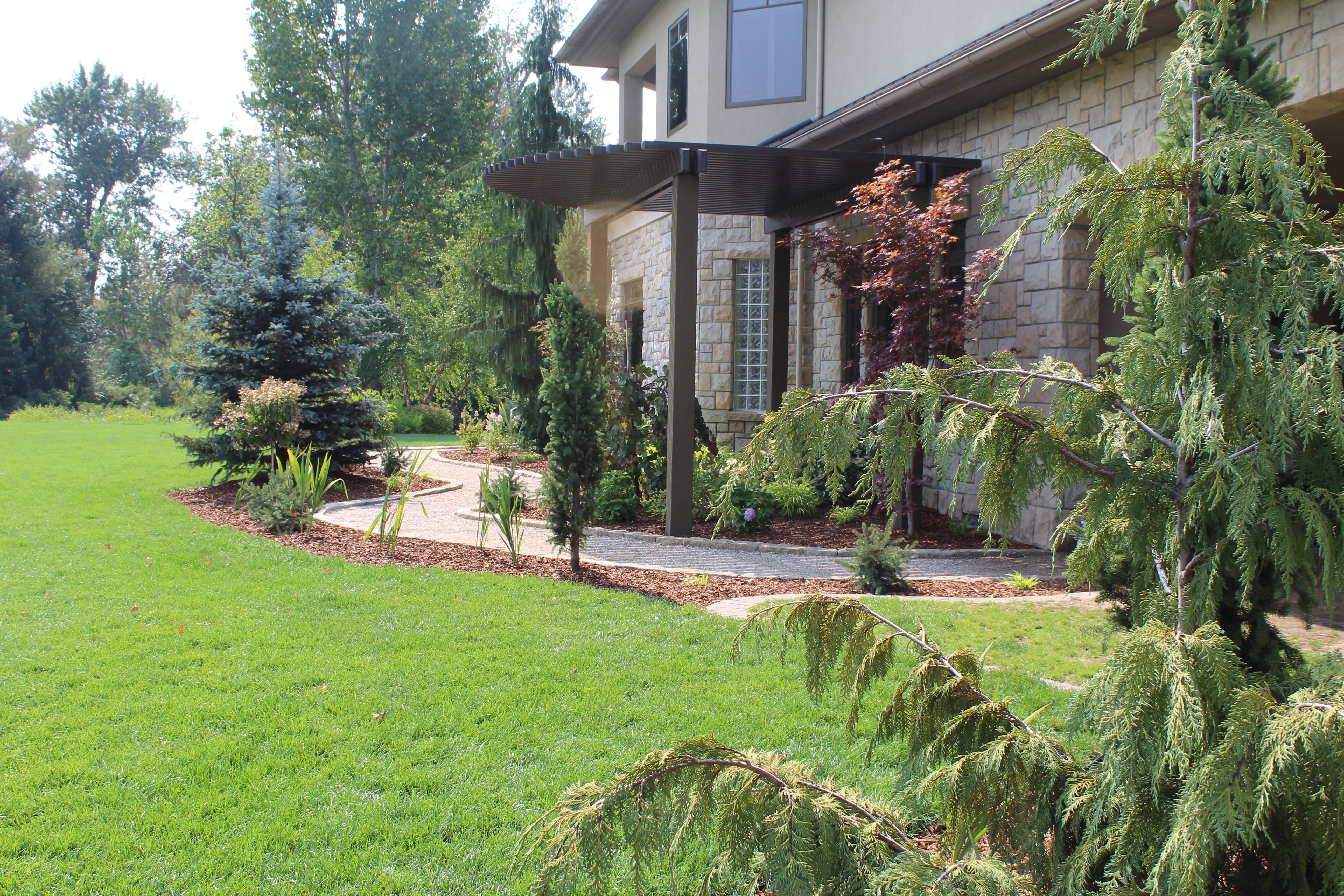 Sideyard Winding Paver Path | The Garden Artist Boise, ID